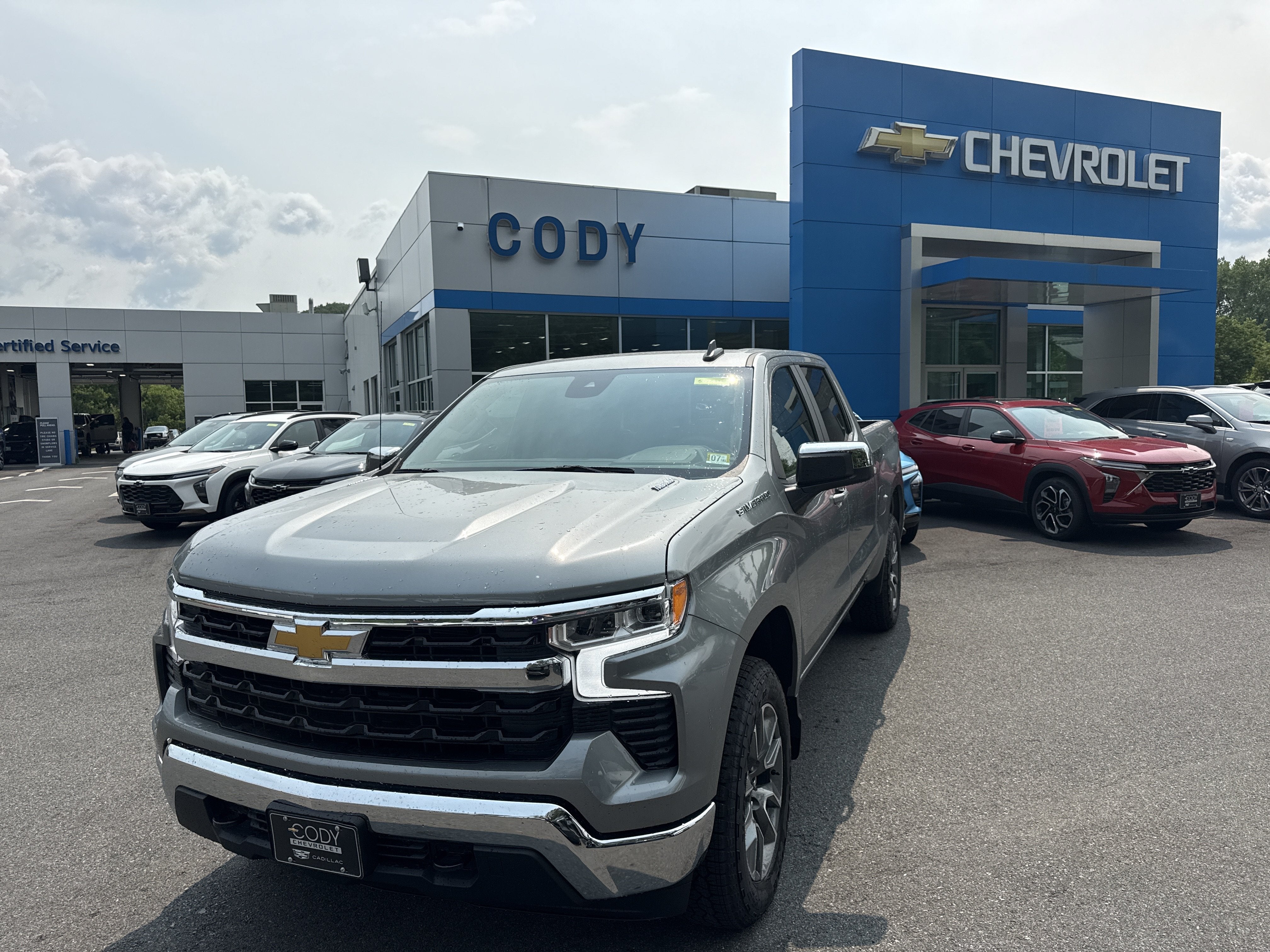 2026 Chevrolet Silverado 1500 LT (2FL) in Sterling Gray Metallic — front three-quarter view