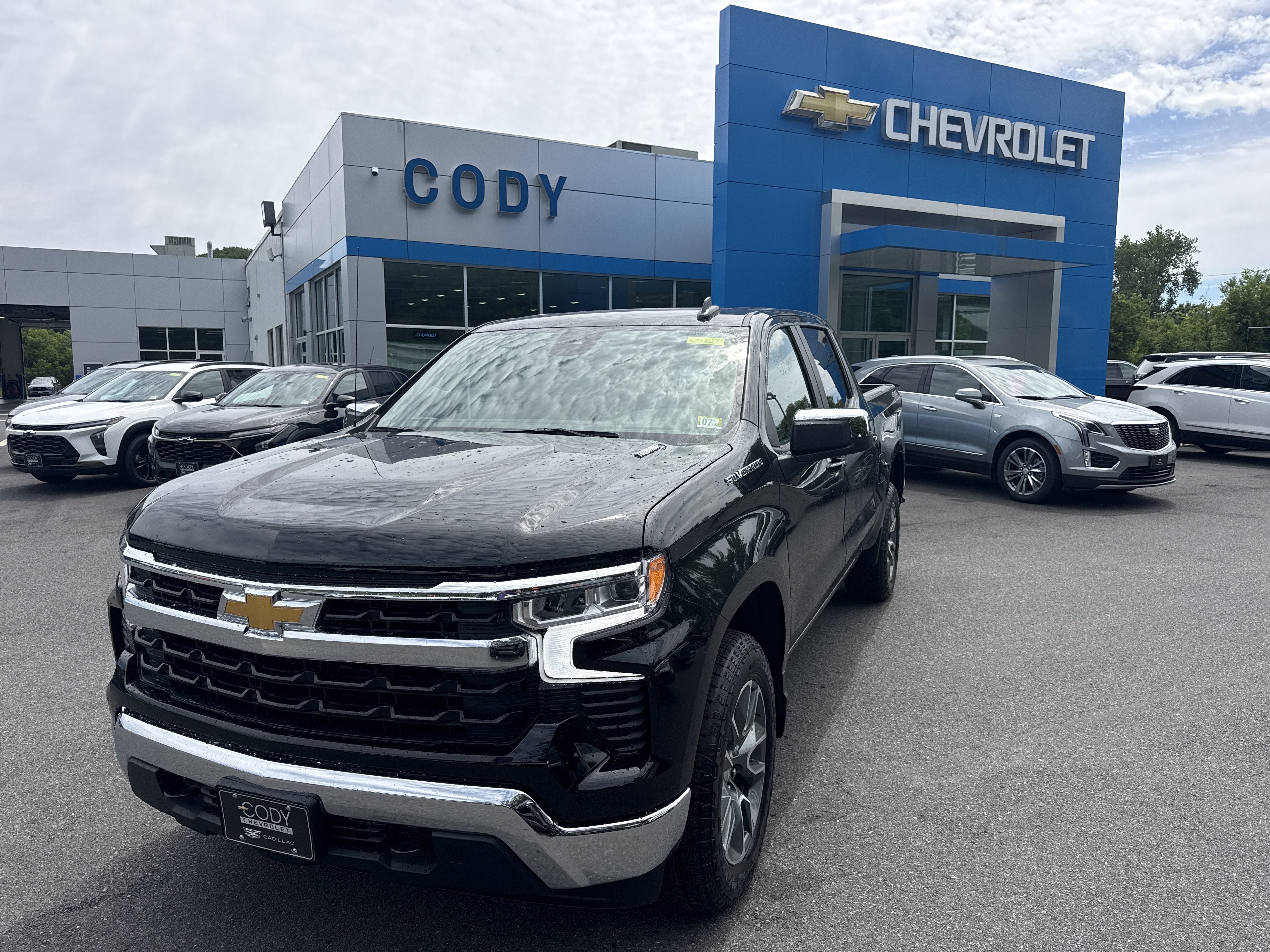 2026 Chevrolet Silverado 1500 LT (2FL) in Black — front three-quarter view