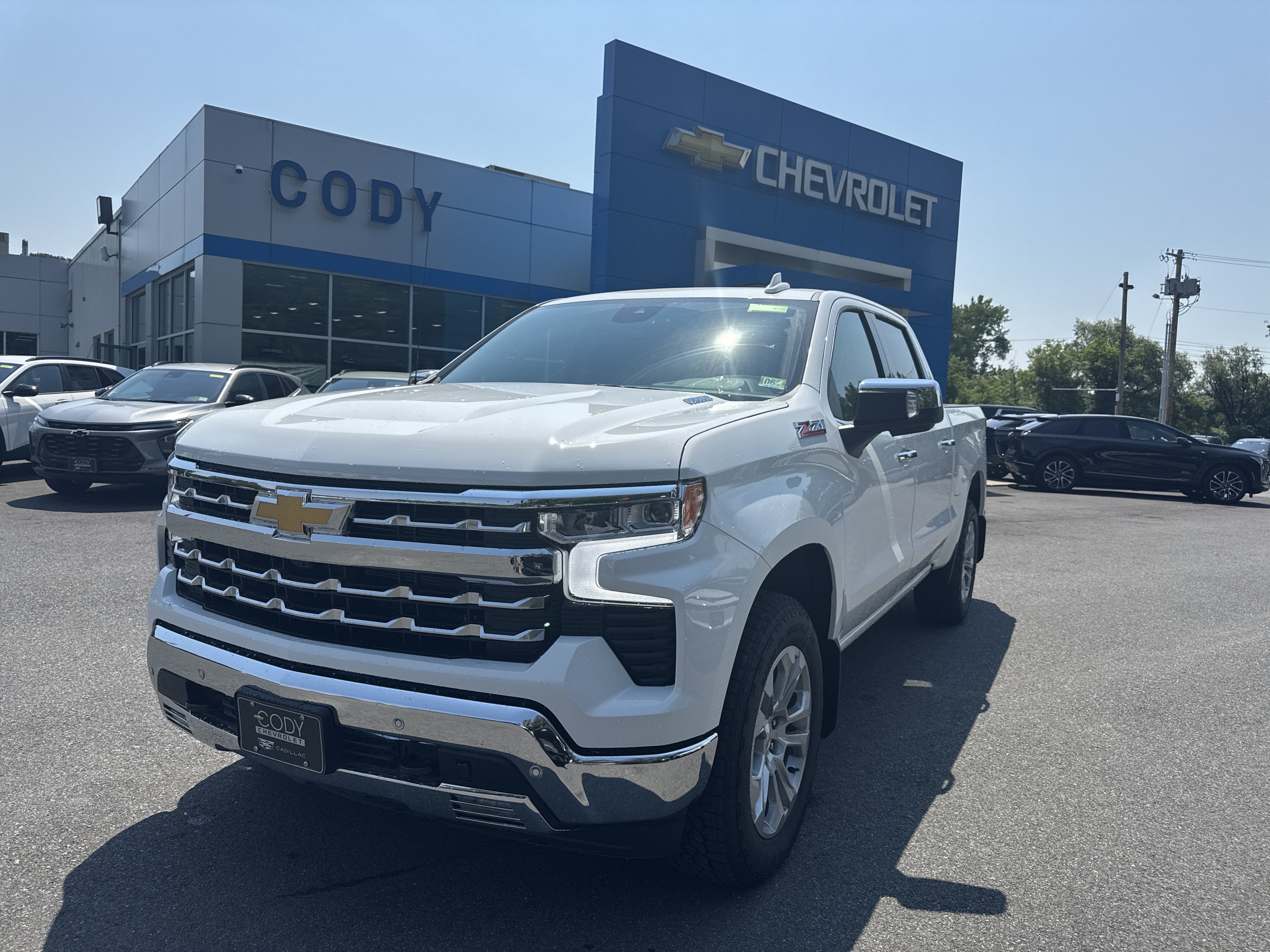 2026 Chevrolet Silverado 1500 LTZ in Summit White — front three-quarter view