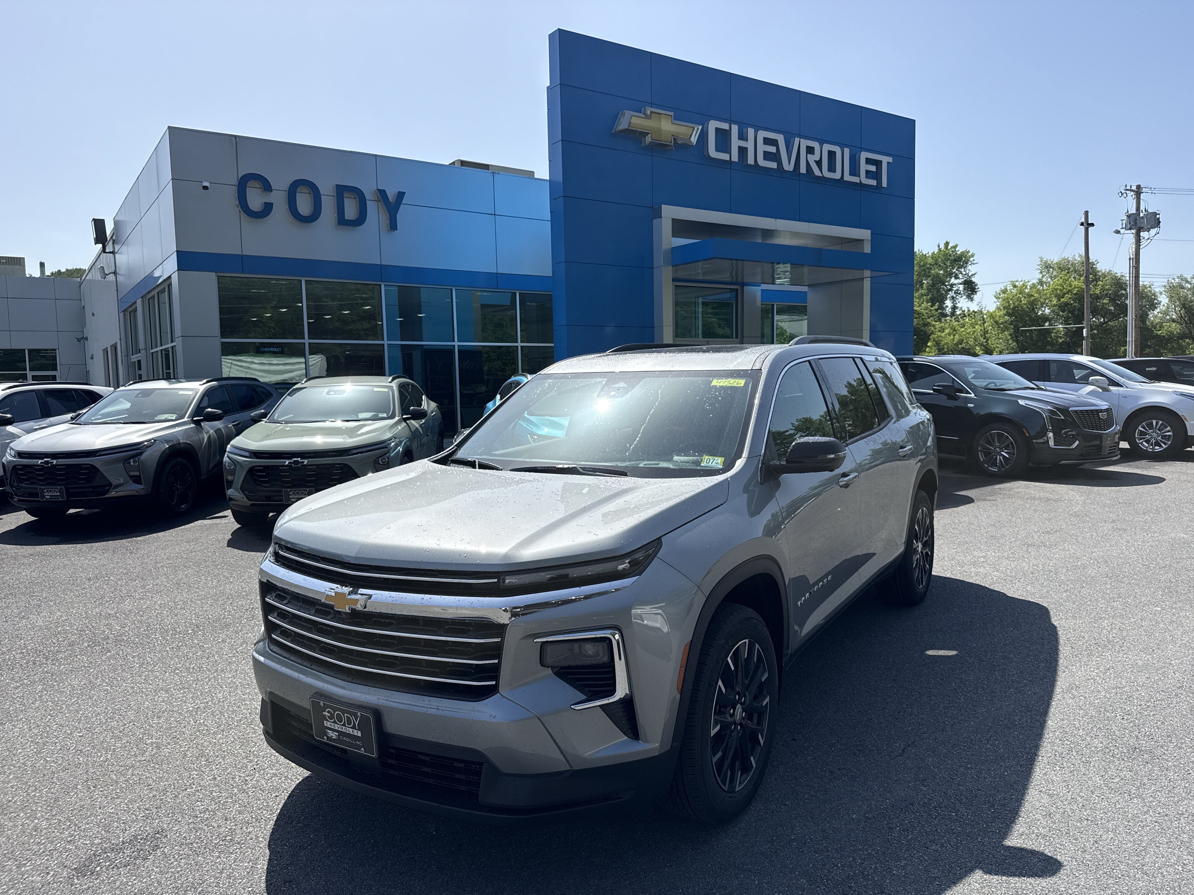 2026 Chevrolet Traverse LT in Sterling Gray Metallic — front three-quarter view
