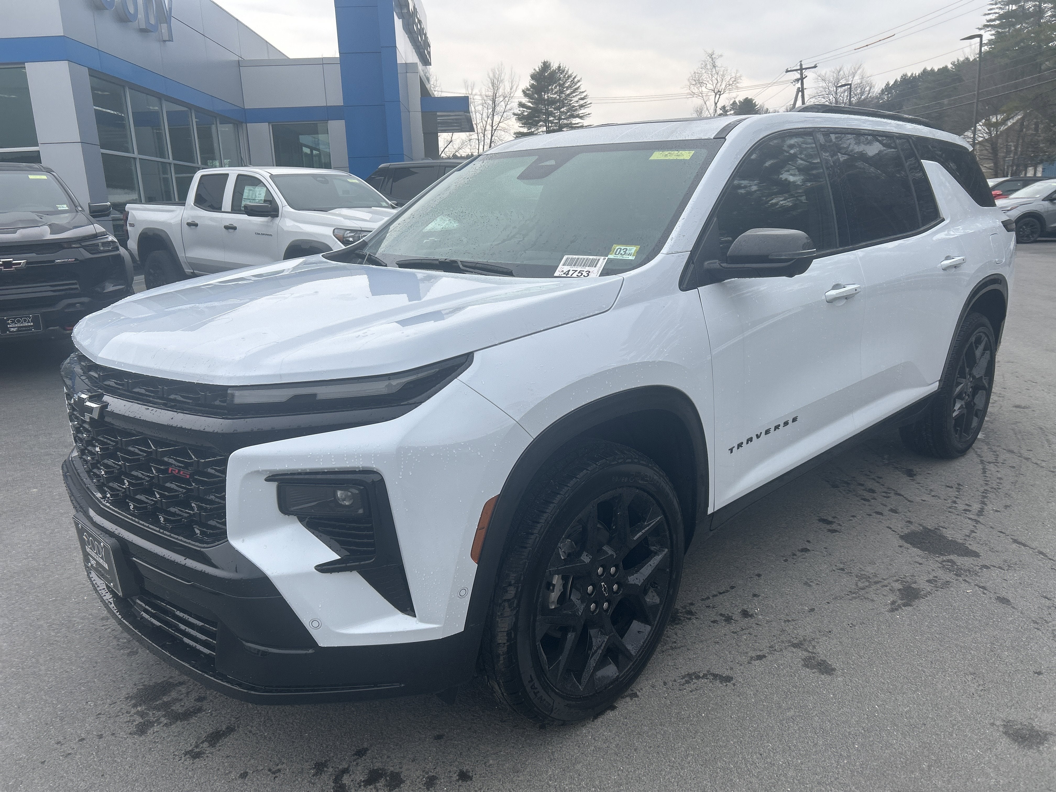 2026 Chevrolet Traverse RS in Polar White Tricoat — front three-quarter view