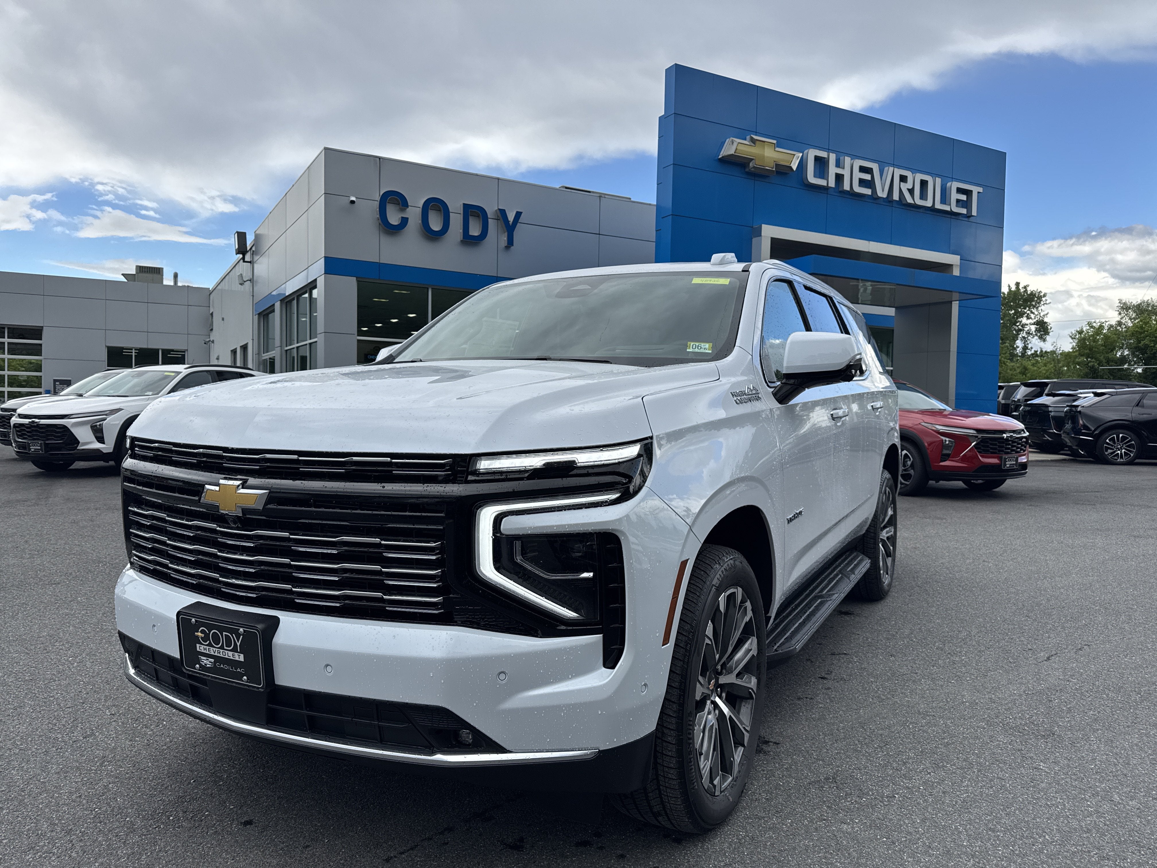 2026 Chevrolet Tahoe High Country in Polar White Tricoat — front three-quarter view