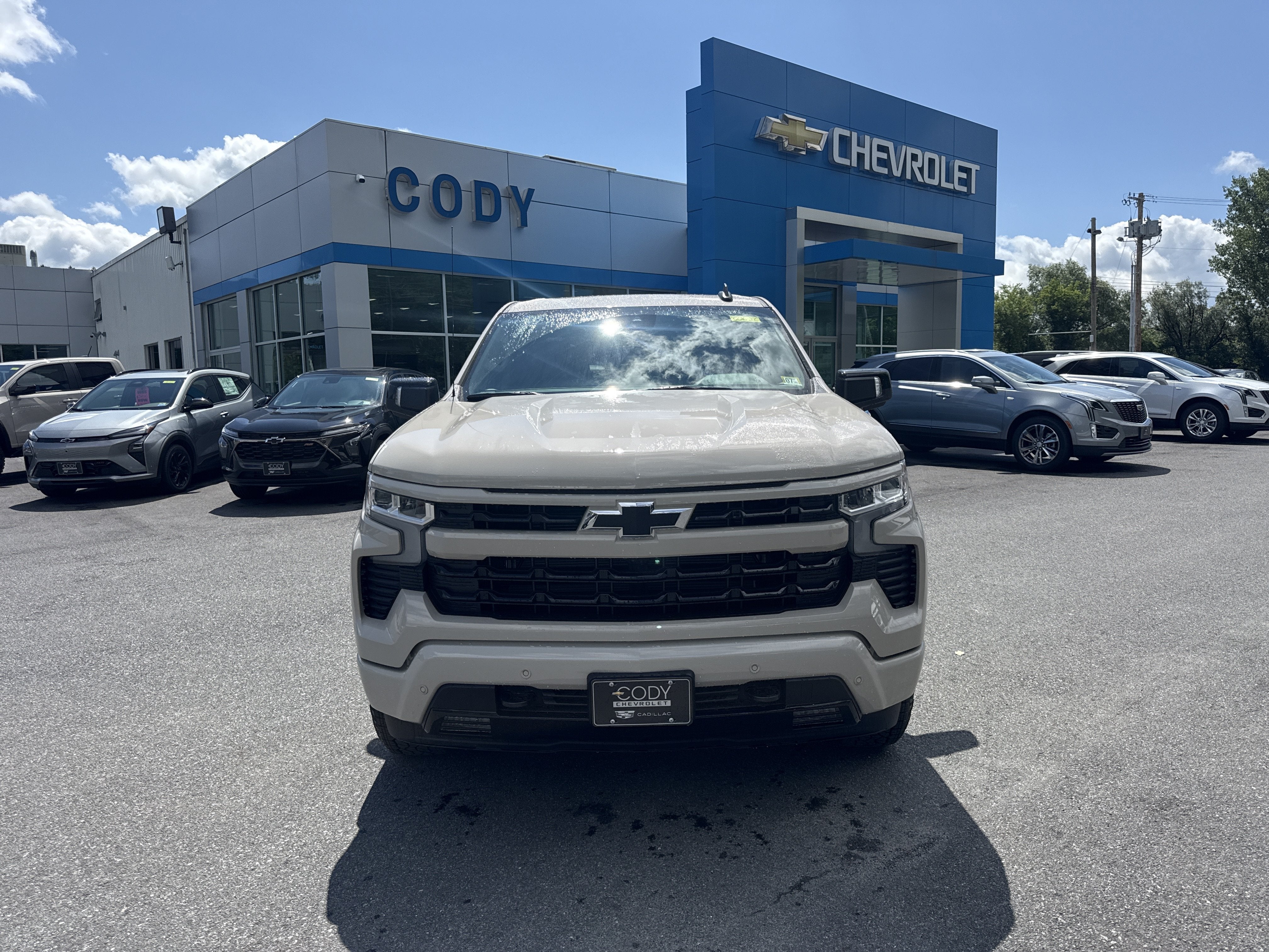 2026 Chevrolet Silverado 1500 RST in White Sands — front three-quarter view