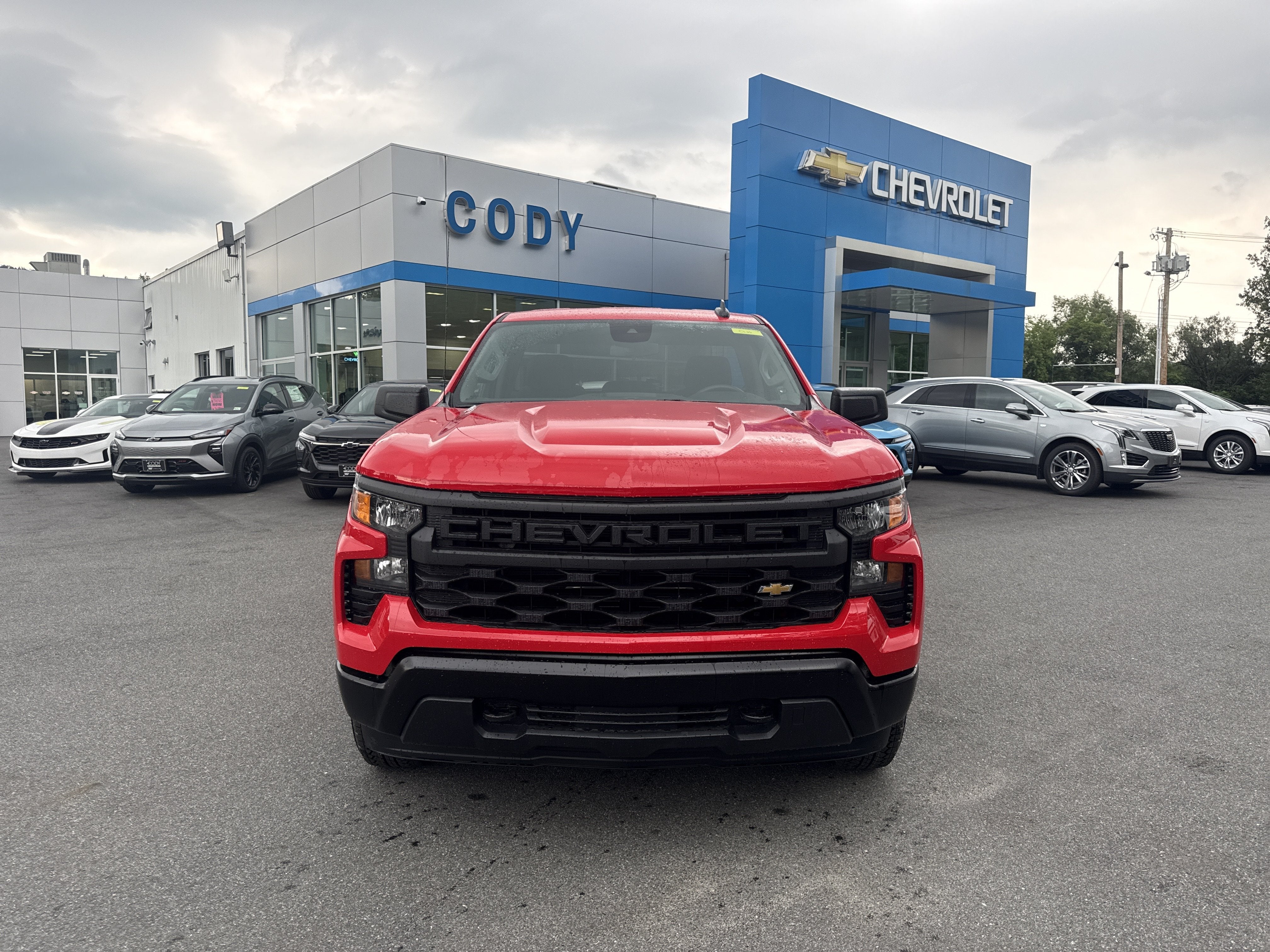 2026 Chevrolet Silverado 1500 WT in Red Hot — front three-quarter view
