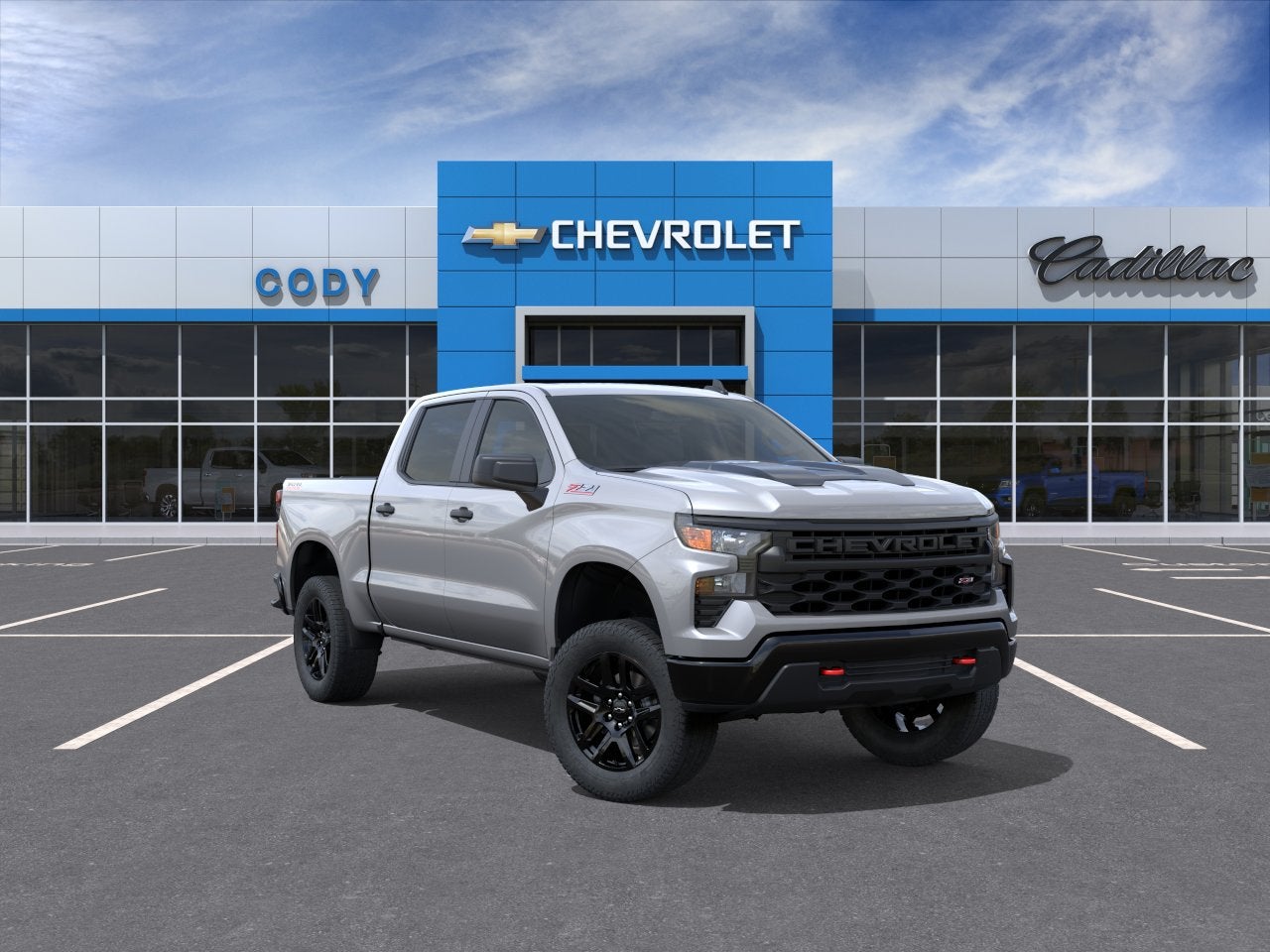 2026 Chevrolet Silverado 1500 Custom Trail Boss in Sterling Gray Metallic — front three-quarter view