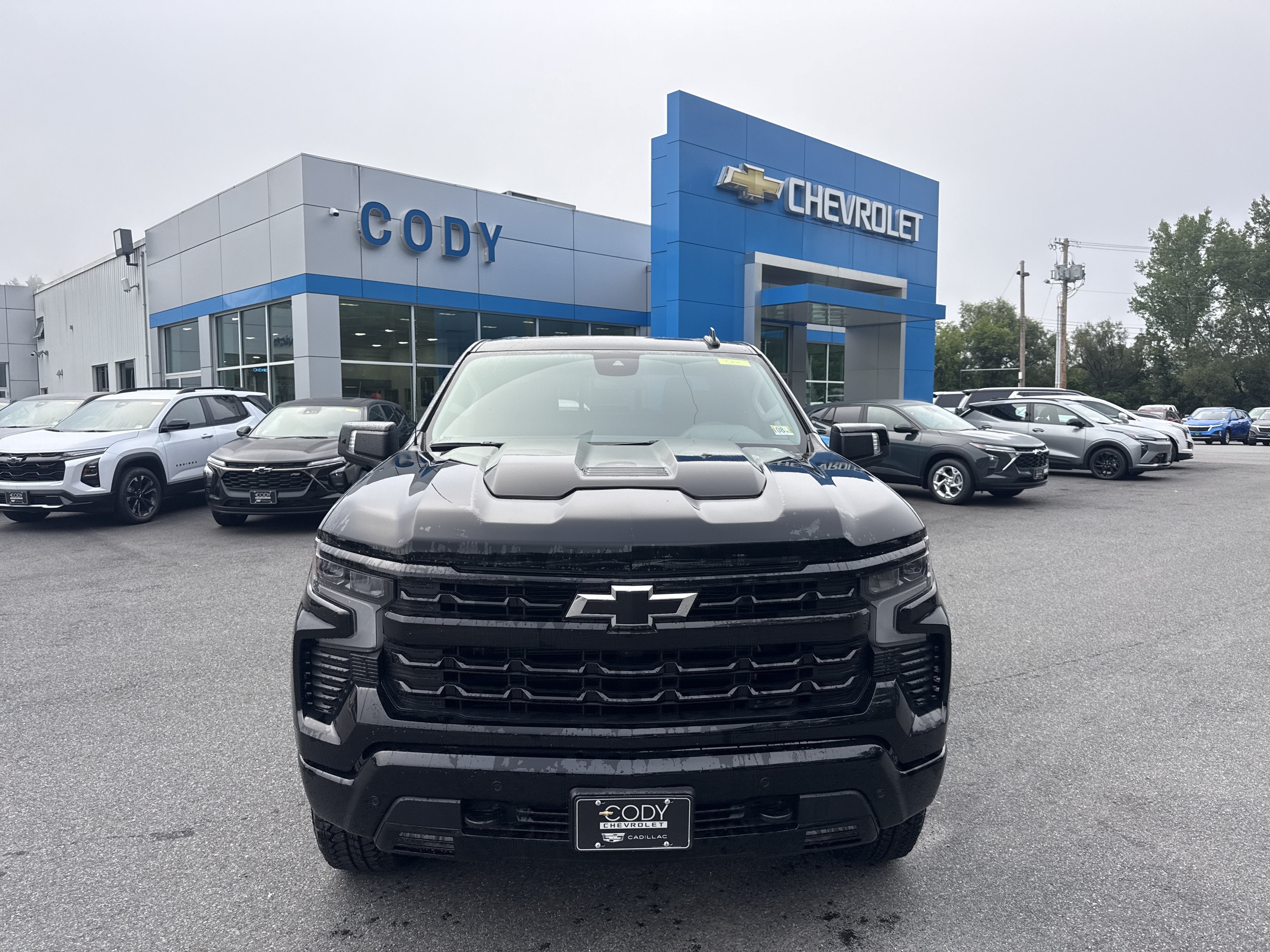 2026 Chevrolet Silverado 1500 LT Trail Boss in Black — front three-quarter view