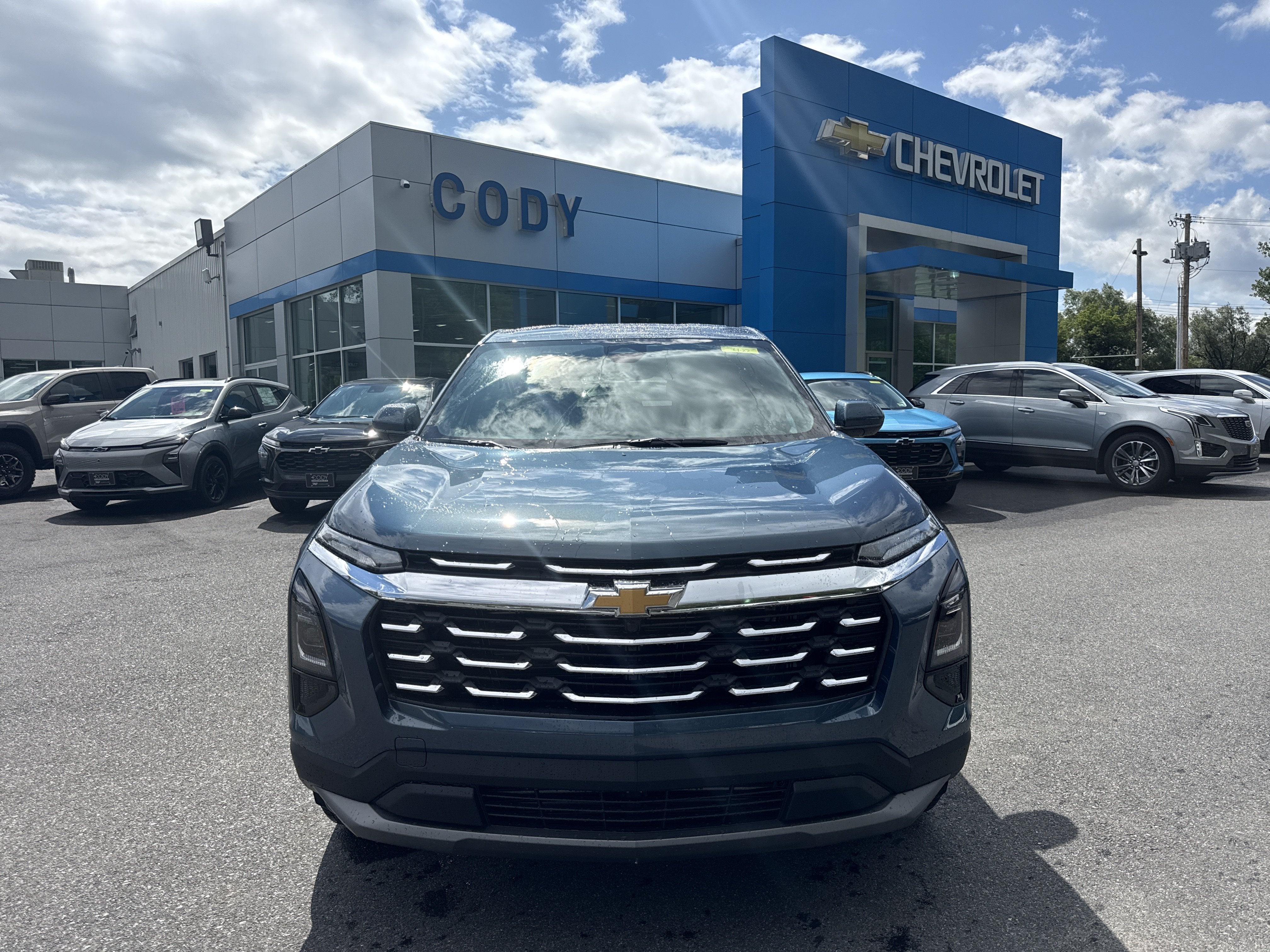 2027 Chevrolet Equinox AWD LT in Lakeshore Blue Metallic — front three-quarter view