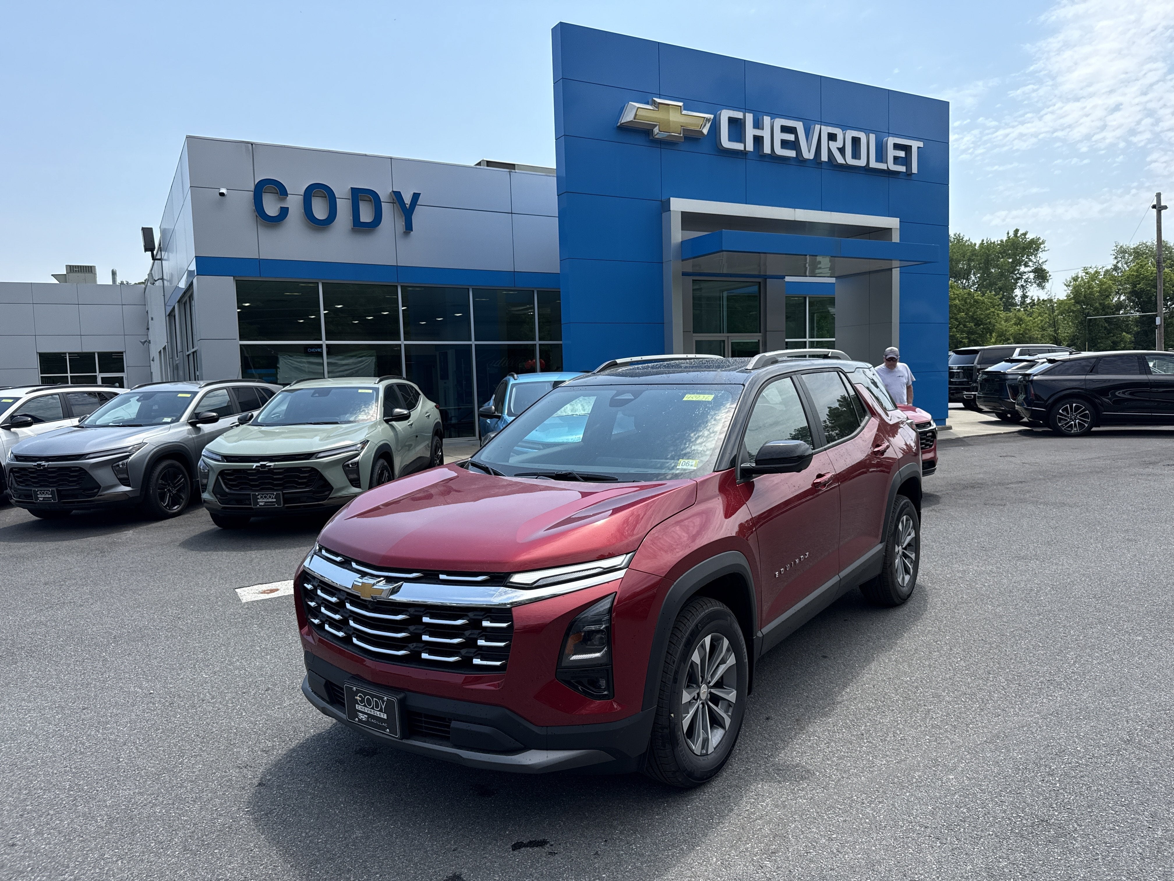 2026 Chevrolet Equinox LT in Radiant Red Tintcoat — front three-quarter view
