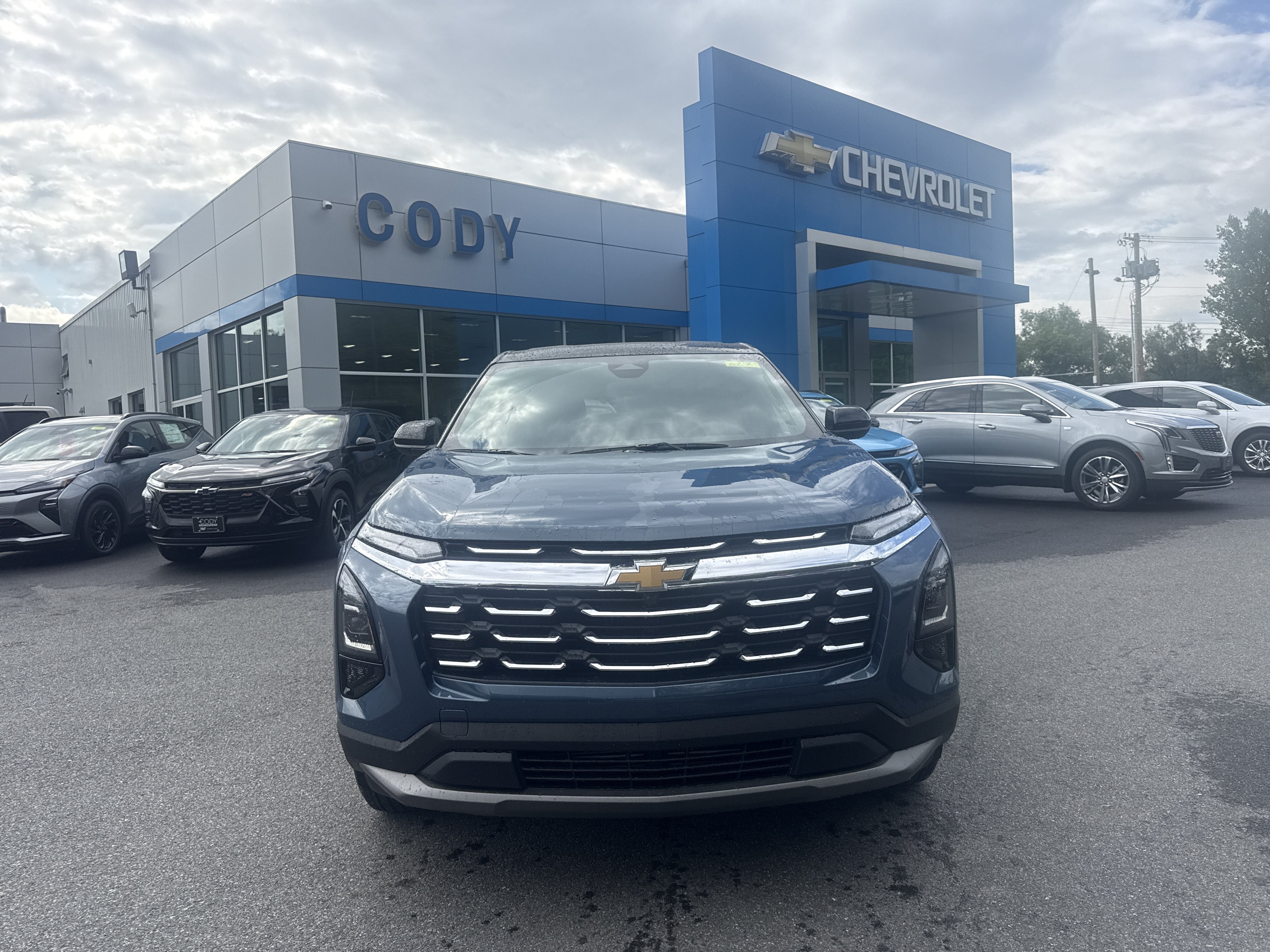 2027 Chevrolet Equinox AWD LT in Lakeshore Blue Metallic — front three-quarter view