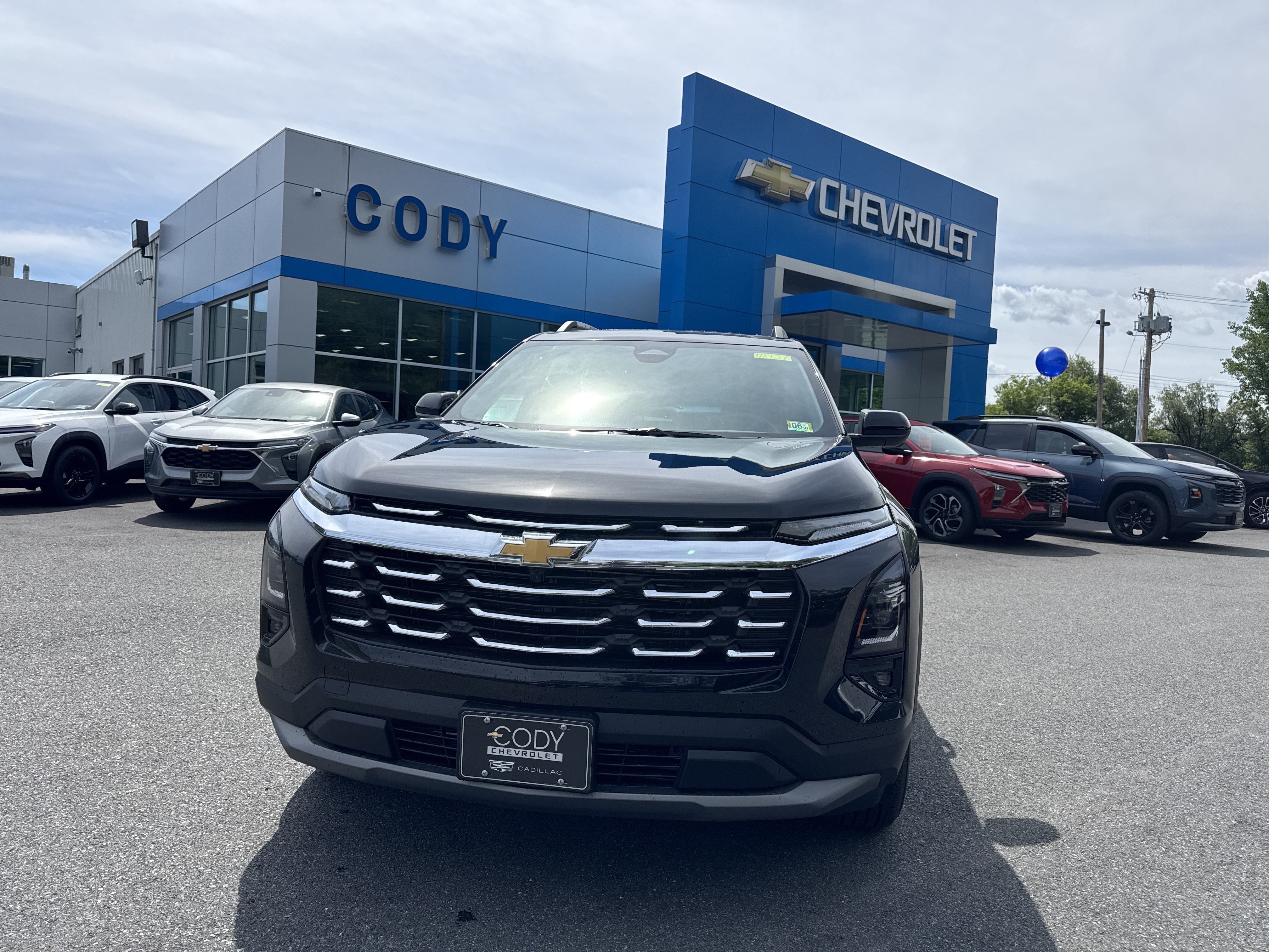 2026 Chevrolet Equinox LT in Mosaic Black Metallic — front three-quarter view