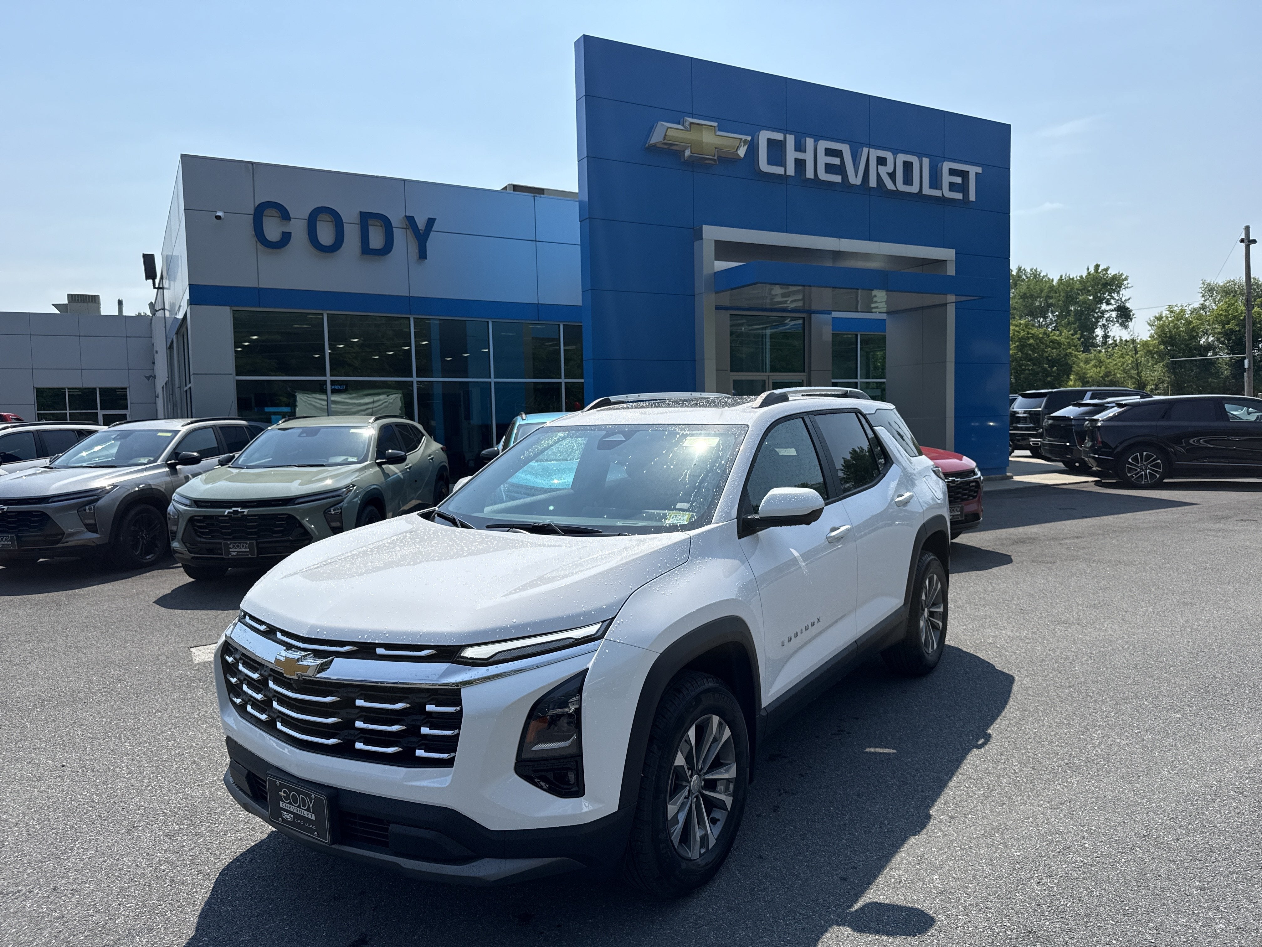 2026 Chevrolet Equinox LT in Summit White — front three-quarter view