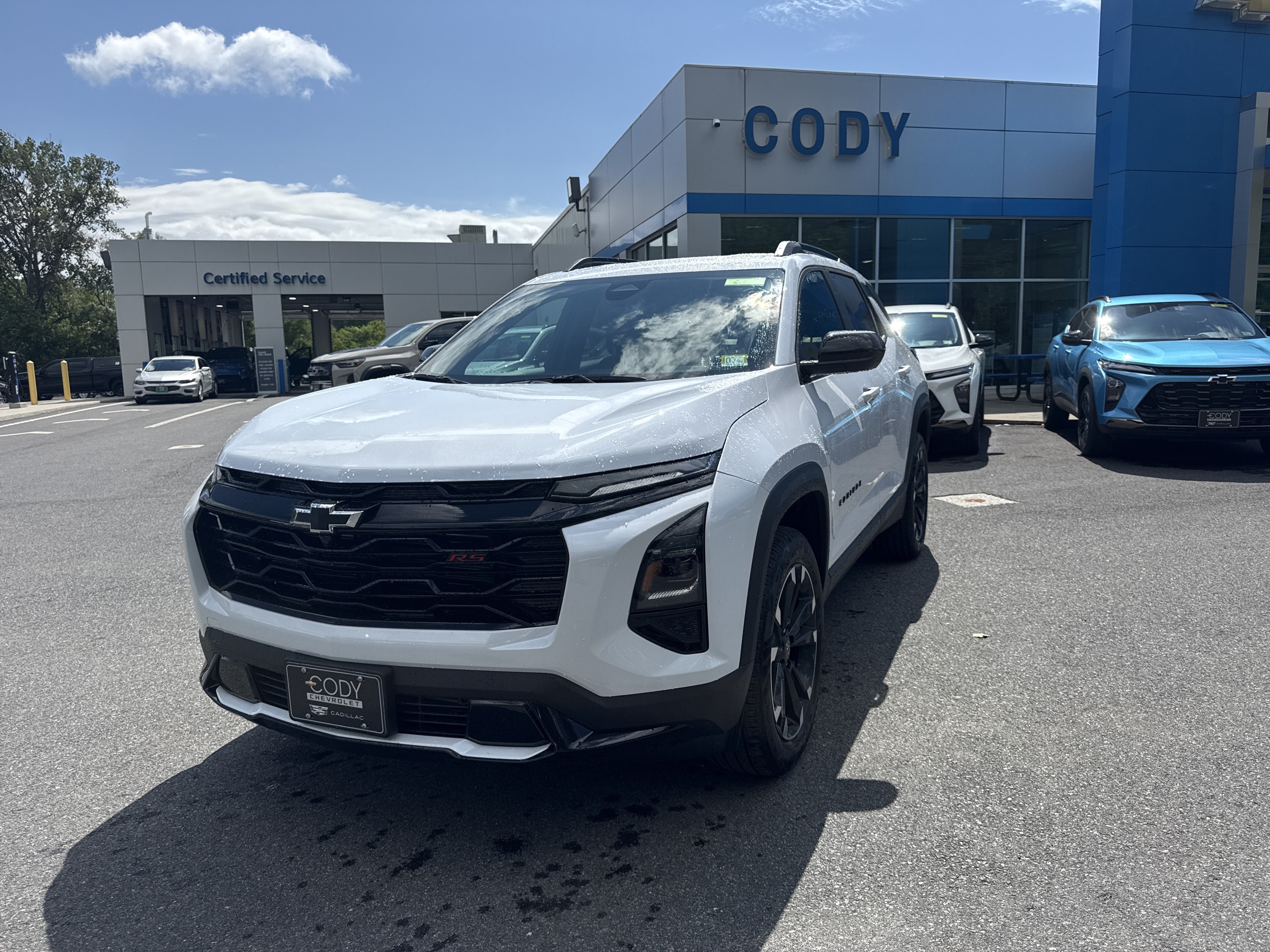 2027 Chevrolet Equinox AWD RS in Polar White Tricoat — front three-quarter view