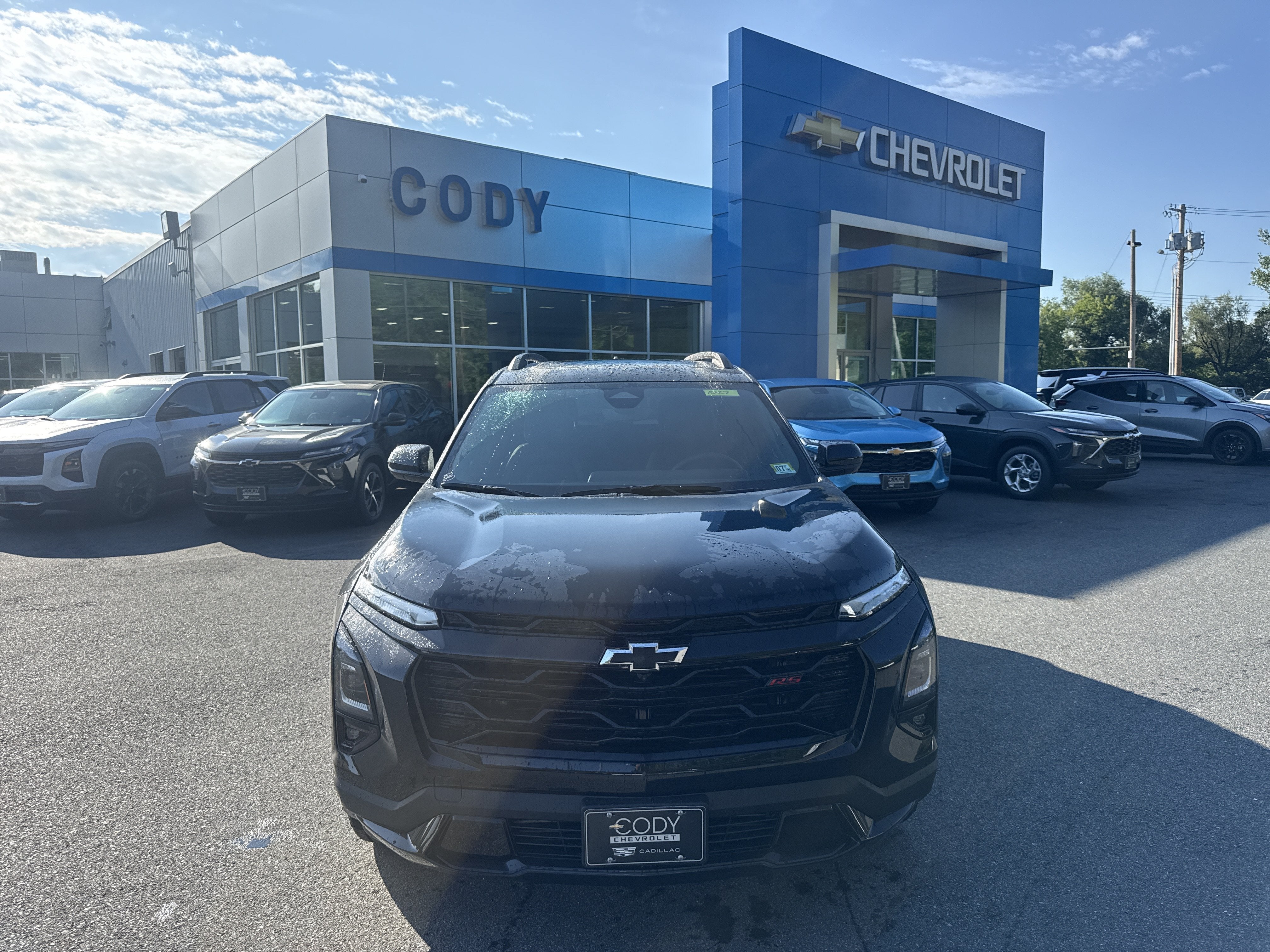 2027 Chevrolet Equinox RS in Mosaic Black Metallic — front three-quarter view